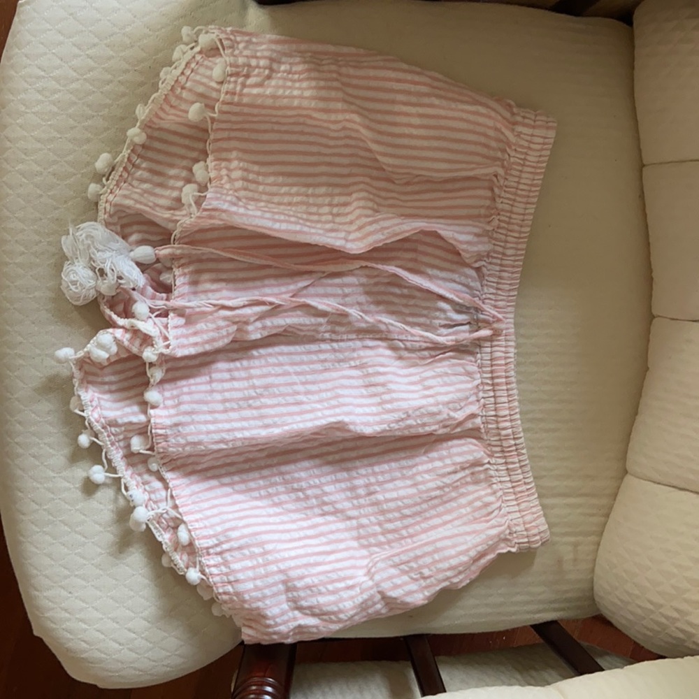 Pink and white striped pom pom shorts